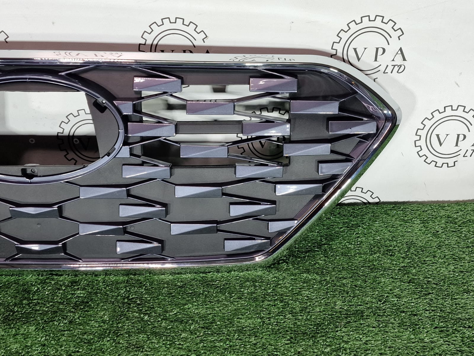 Front bumper grille for Hyundai Ioniq 2019-2022 with chrome trim - badge area detail